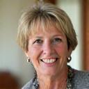 Sarah M., a smiling woman in her late 40s