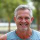 Mark, a man in his early 50s, looking active and revitalized after boosting his energy levels.